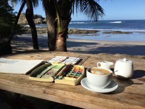 painting in watercolors at LaLuna in Playa Pelada, Nosara, Costa Rica. Wonderful Costa Rican coffee and view.